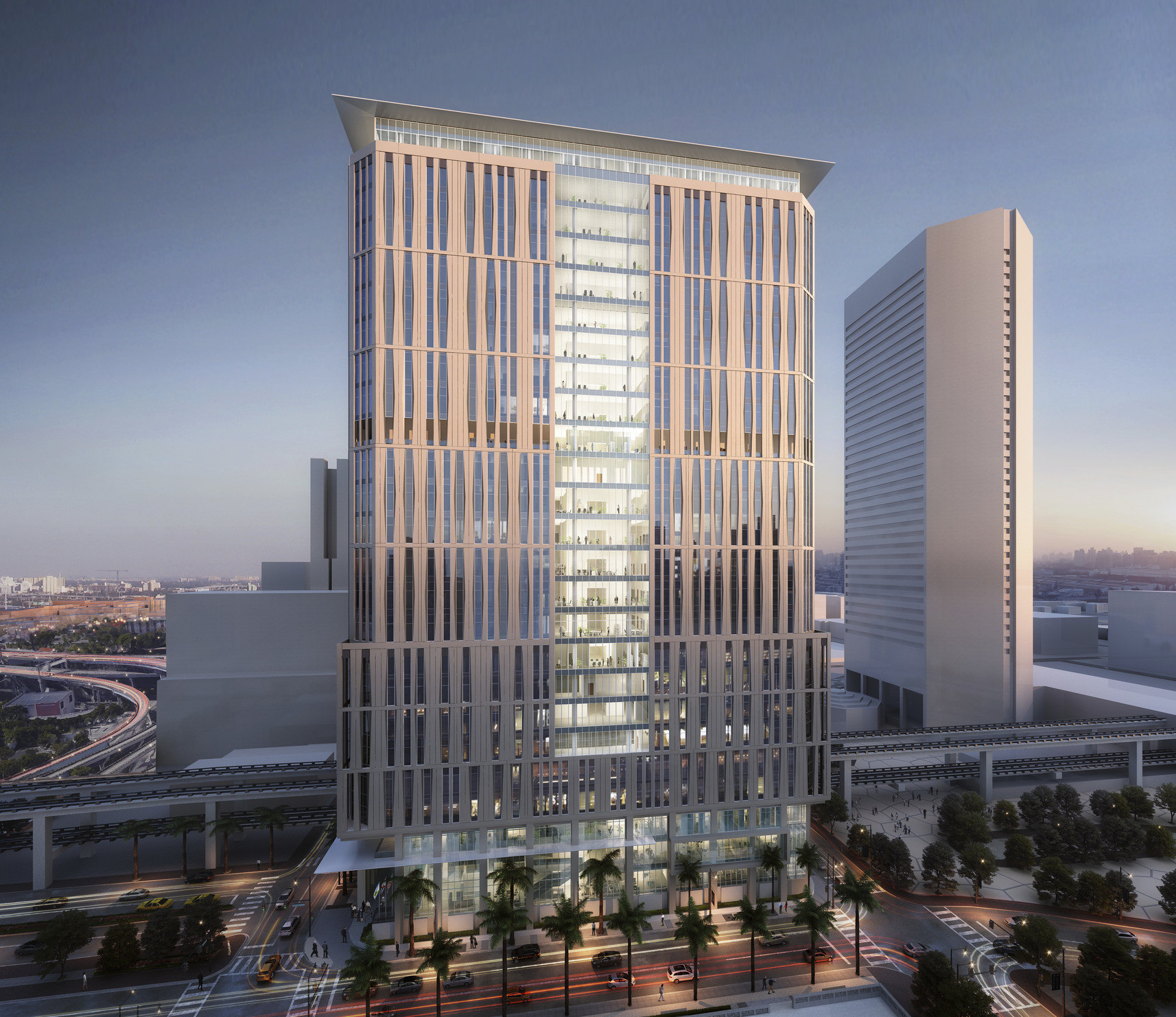 Close up of the Miami-Dade County Civil Courthouse, a 25 story beige tower with glass center section Close up of the Miami-Dade County Civil Courthouse, a 25 story beige tower with glass center section