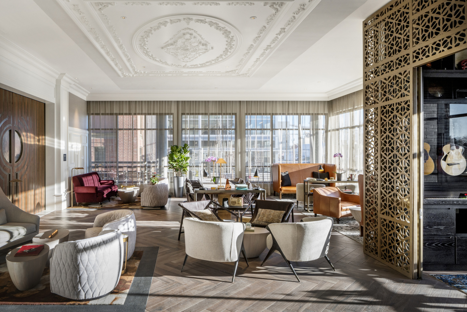lobby with white seating and ornate ceiling with crown molding at the The Elizabeth Hotel, Autograph Collection by Marriott lobby with white seating and ornate ceiling with crown molding at the The Elizabeth Hotel, Autograph Collection by Marriott