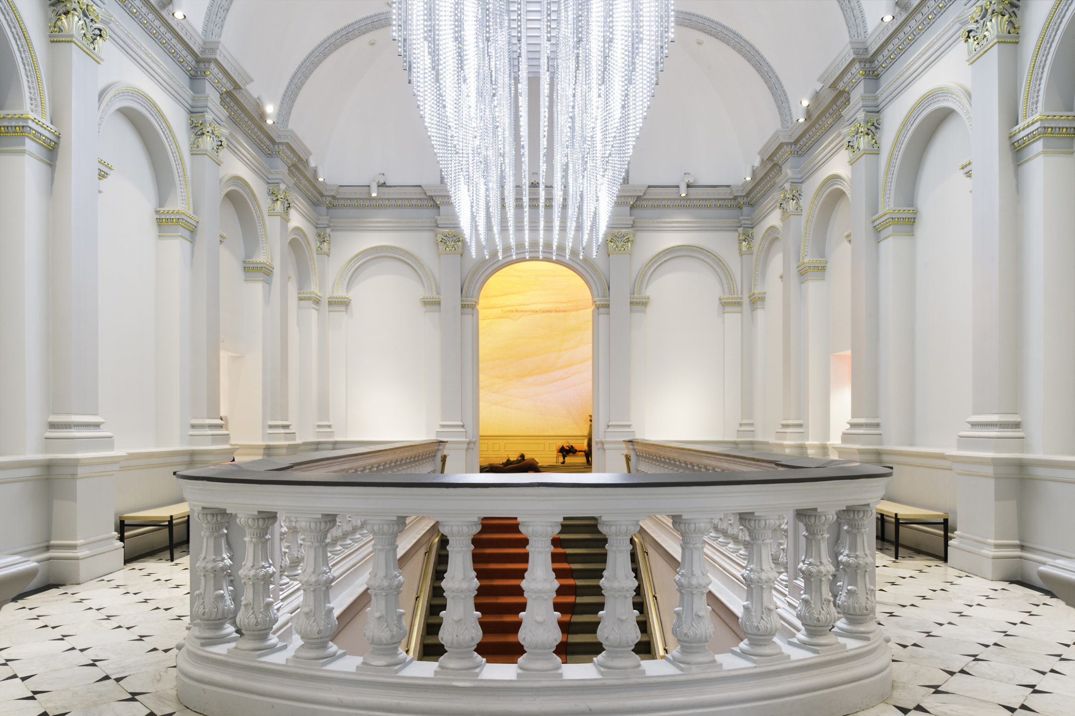 leo villareal sculptural chandelier hanging over a staircase the renwick gallery