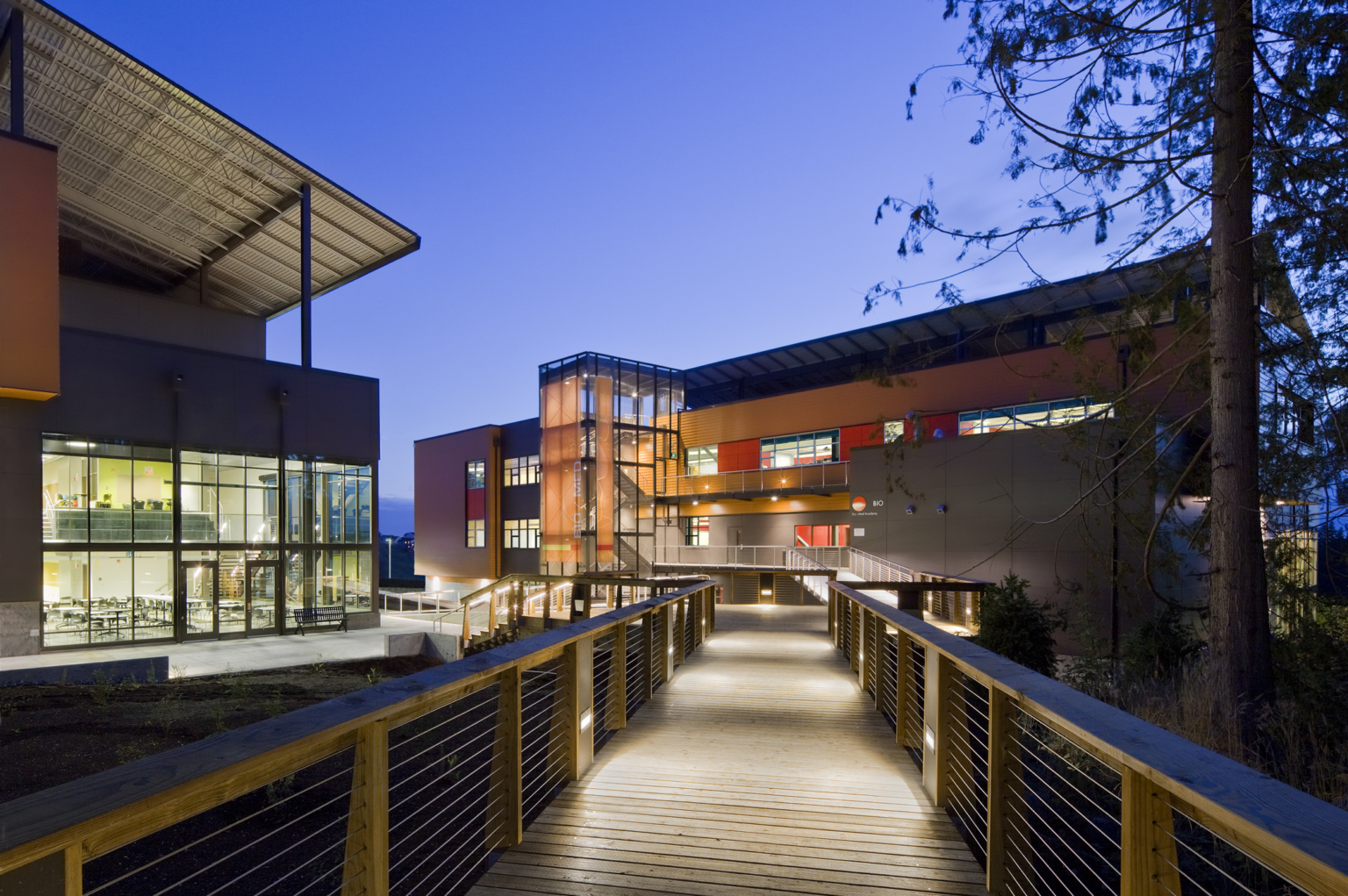 Evening stroll on outdoor wood bridge connecting the campus at Marysville Getchell High School. Evening stroll on outdoor wood bridge connecting the campus at Marysville Getchell High School.