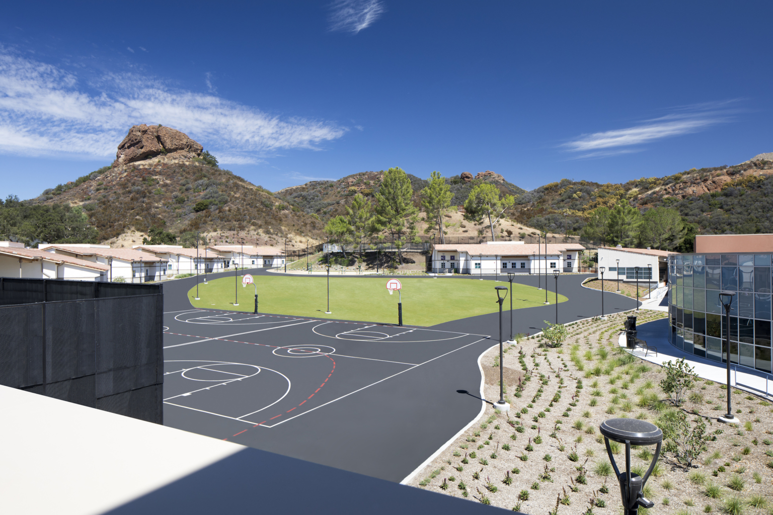 LA County Campus Kilpatrick with basketball court and green grass