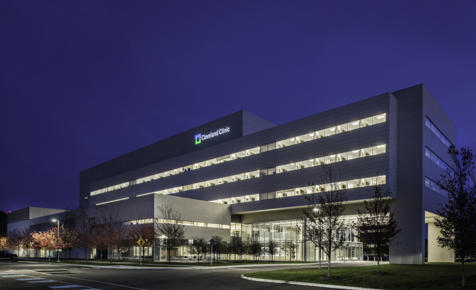 an illuminated hospital against a dark sky an illuminated hospital against a dark sky