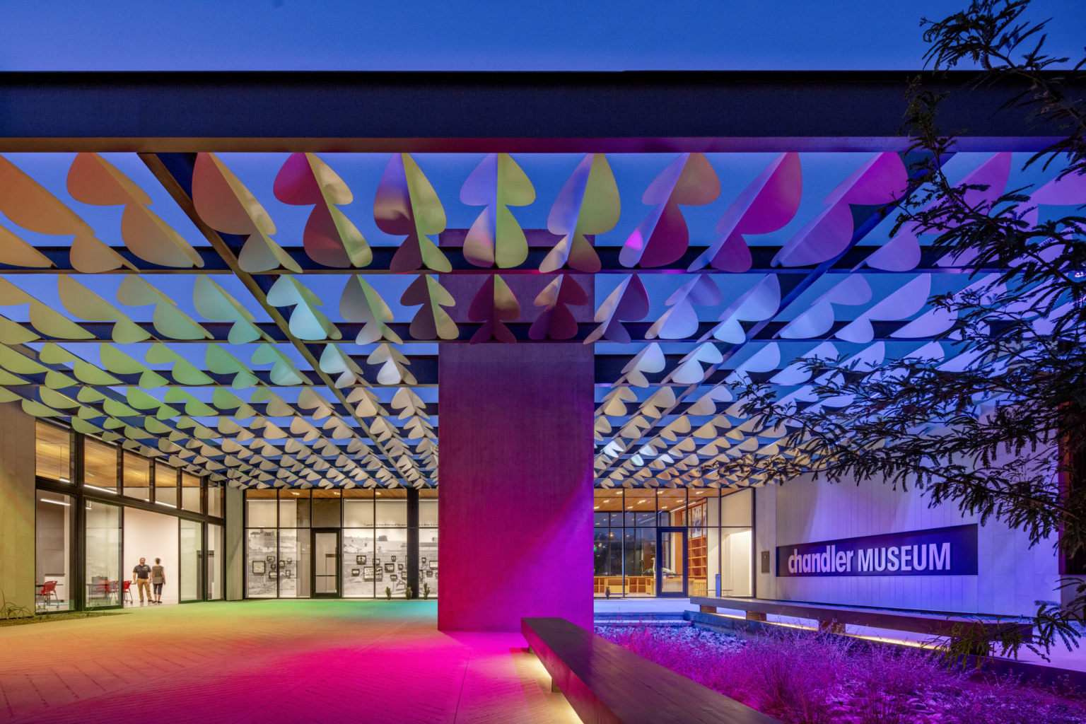 Infinite Shade at the Chandler Art Museum illuminated in multicolor array at night