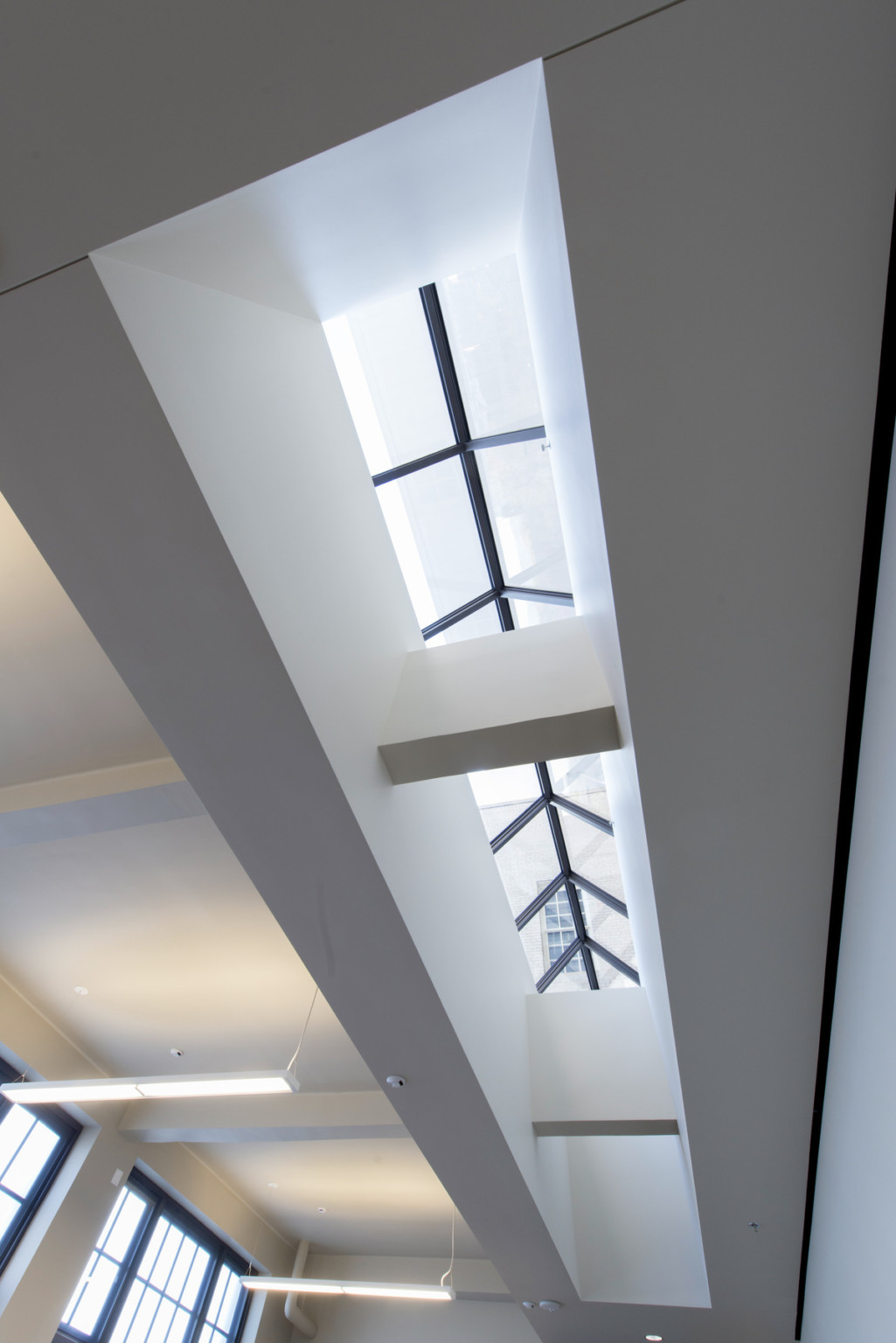 Skylight between 2 connected parallel grey beams