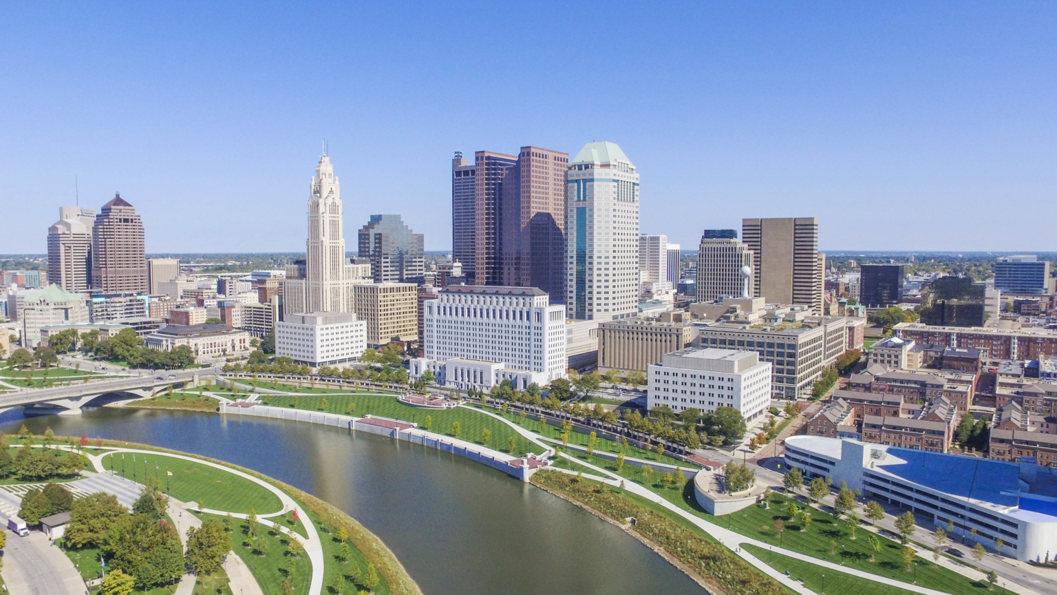 the columbus ohio skyline with the river and recreation paths in the foreground