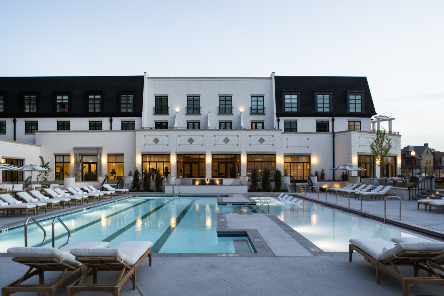 chaise lounge chairs around an outdoor pool chaise lounge chairs around an outdoor pool