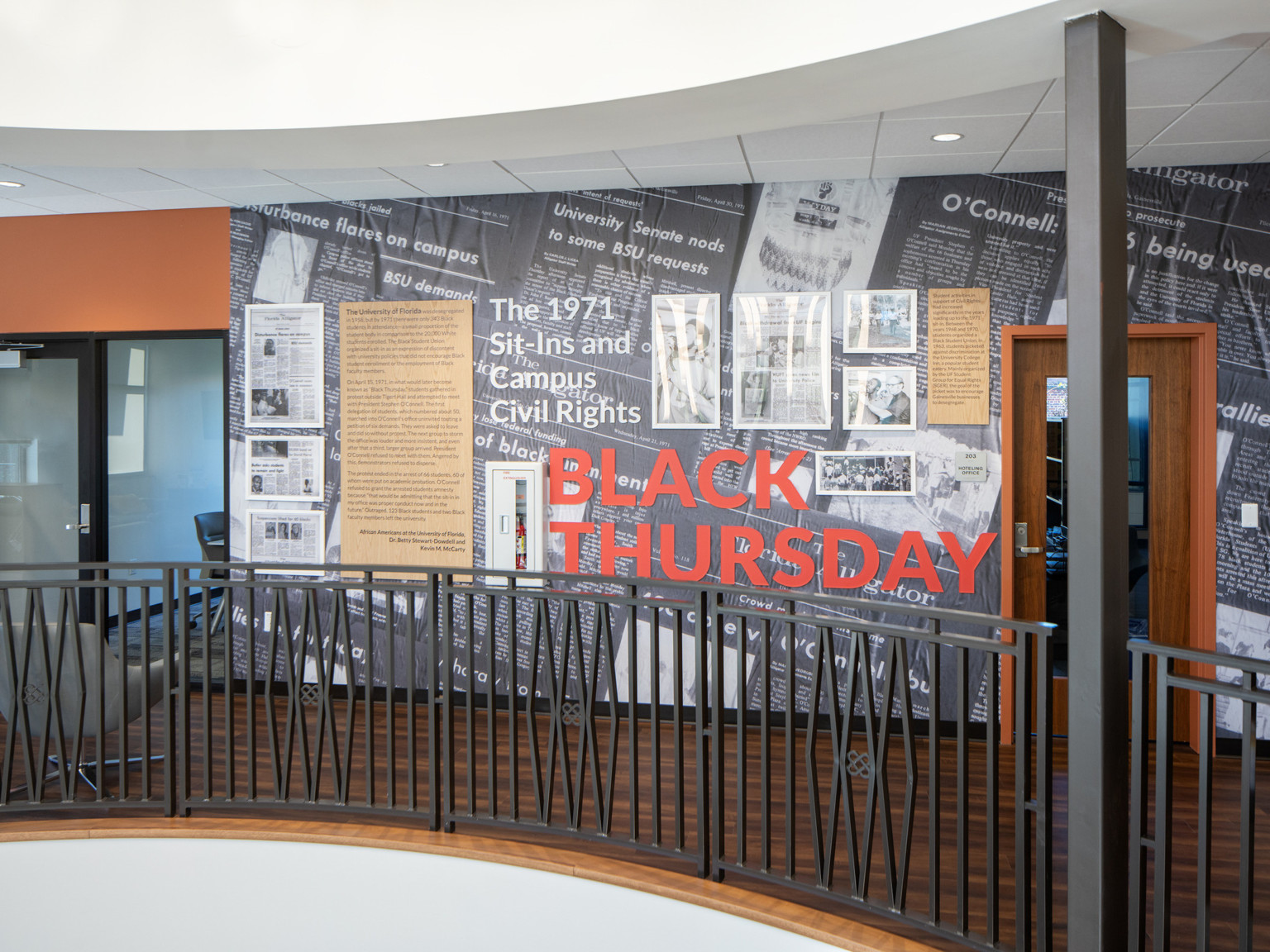 Black and white mural of newspaper clippings and information labeled Black Thursday, The 1971 Sit-Ins and Campus Civil Rights