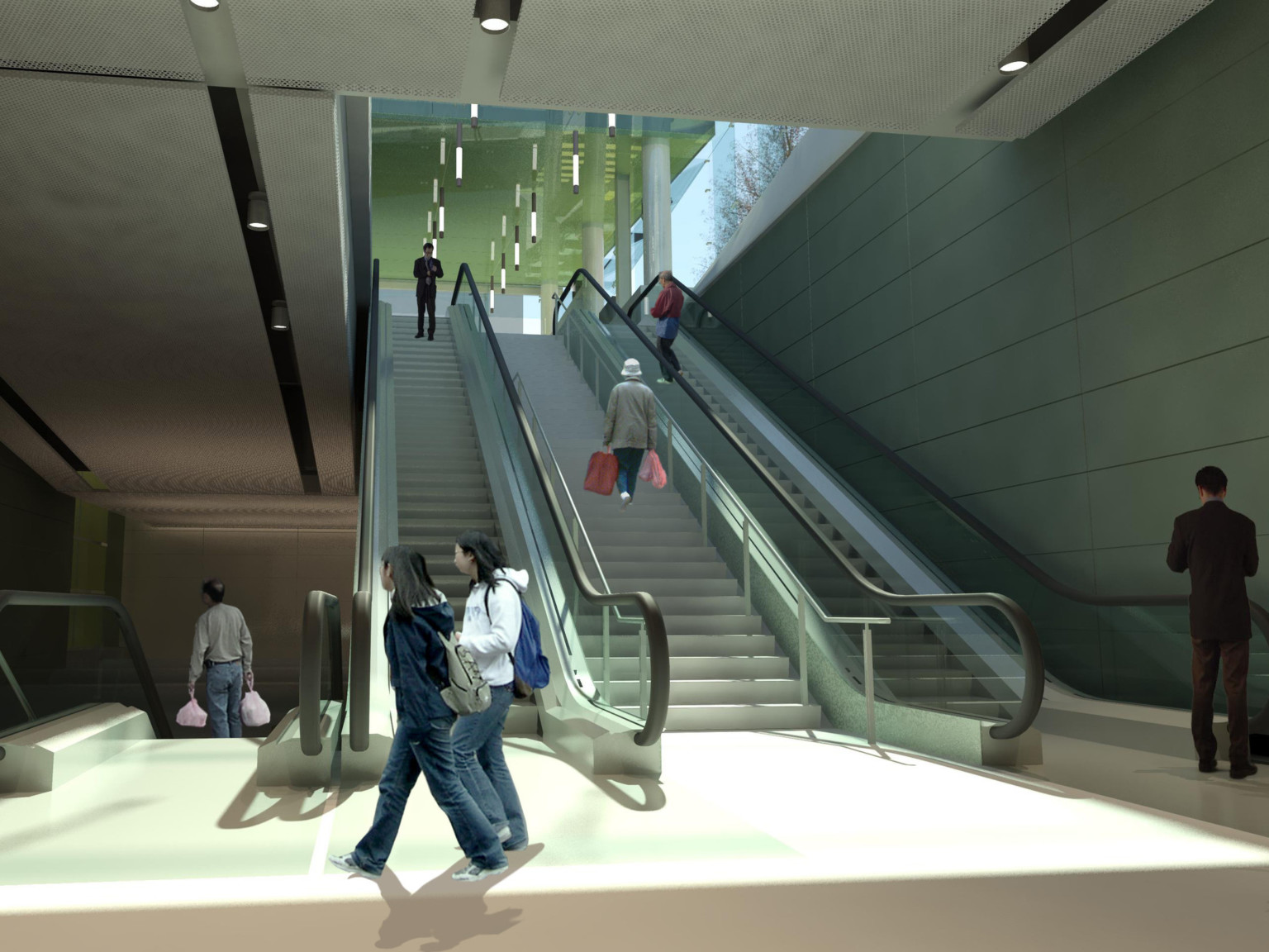 Landing with escalators to left and right. Grey panel walls with textural ceiling panels, above, with lights recessed between
