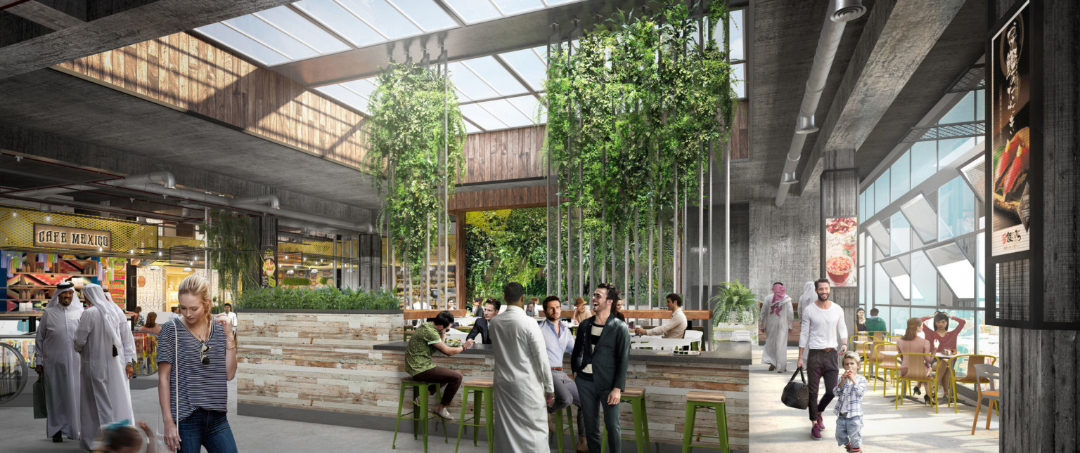 Bar under recessed skylight with decorative columns covered in greenery. Right, a wall of windows with panels angled open