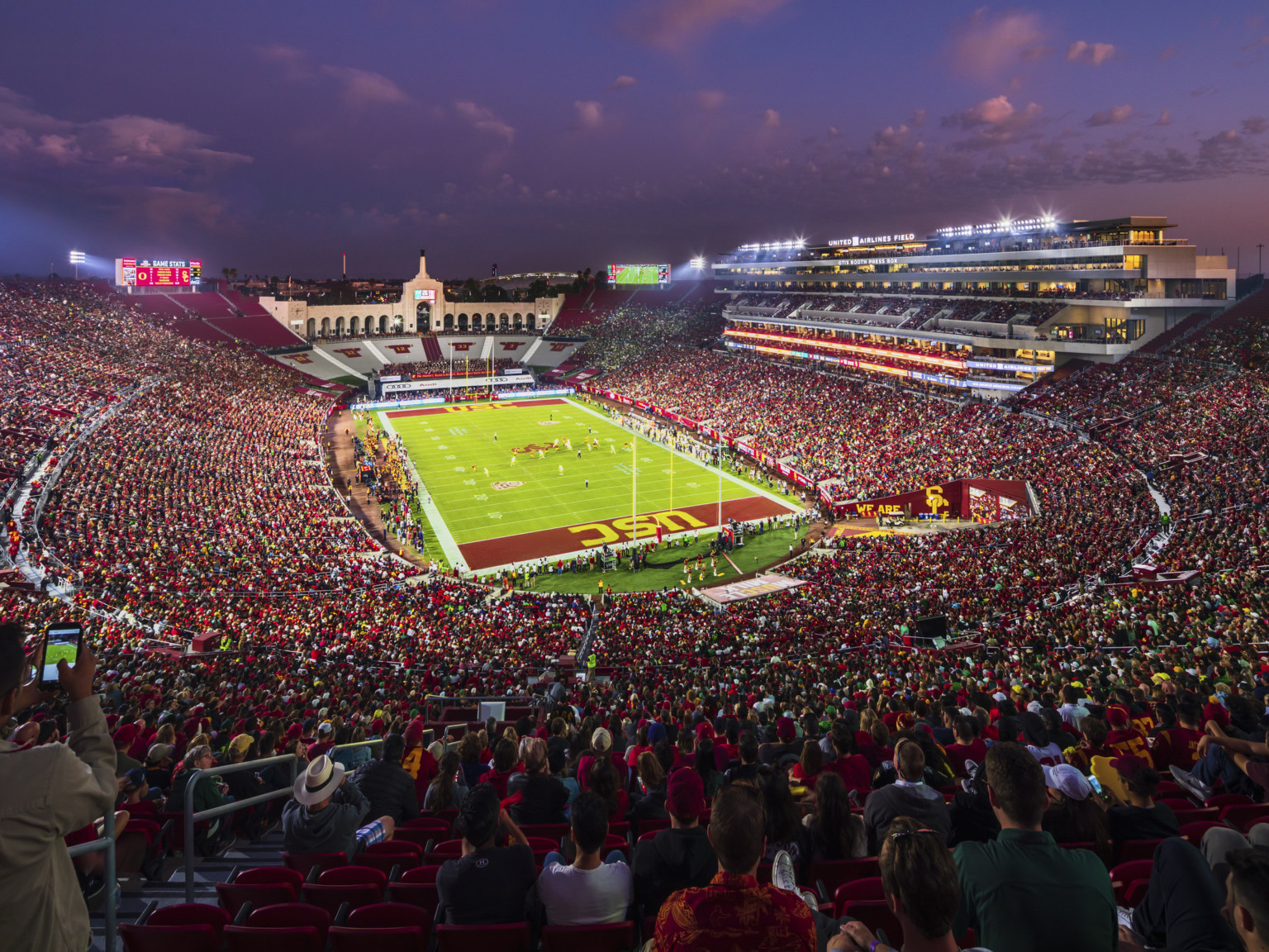 Full stadium bowl during dusk game at the LA Memorial Coliseum