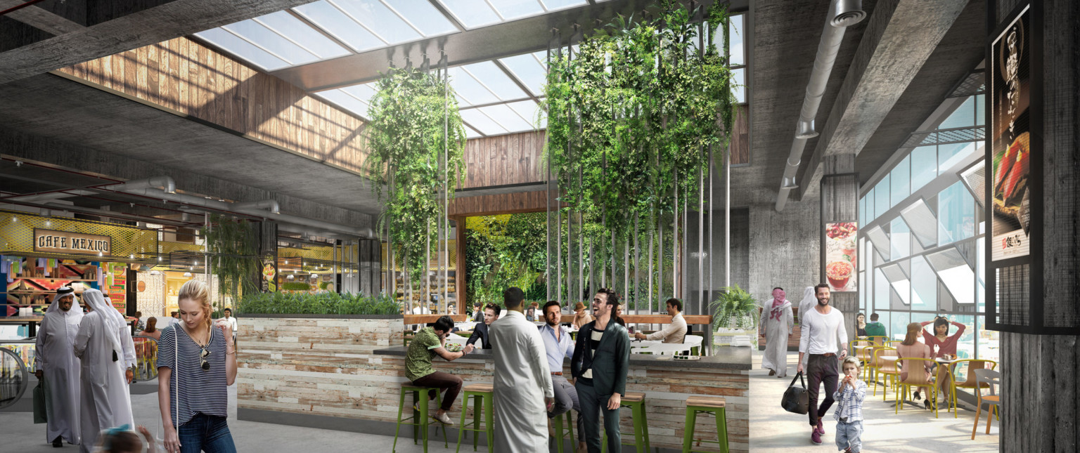 Bar under recessed skylight with decorative columns covered in greenery. Right, a wall of windows with panels angled open