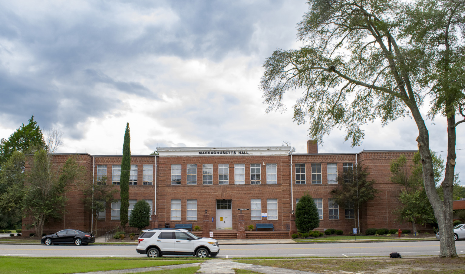 Massachusetts Hall at Voorhees College. A brick 2 story building with lined with rectangular windows and a white cornice Massachusetts Hall at Voorhees College. A brick 2 story building with lined with rectangular windows and a white cornice