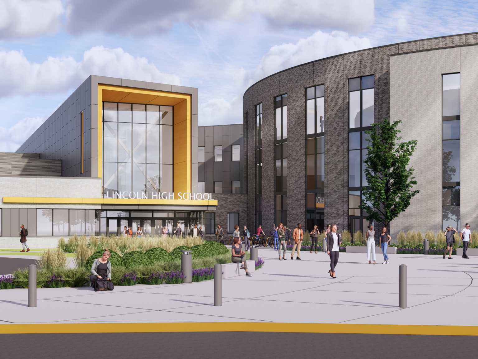 Front entrance to Lincoln High School. Landscaped sidewalk to 3 story building with covered entrance, round building to right Front entrance to Lincoln High School. Landscaped sidewalk to 3 story building with covered entrance, round building to right