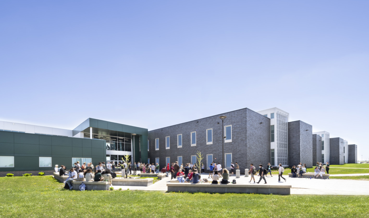 Exterior courtyard of Sioux Falls' Jefferson High School with wrapped facade square entry