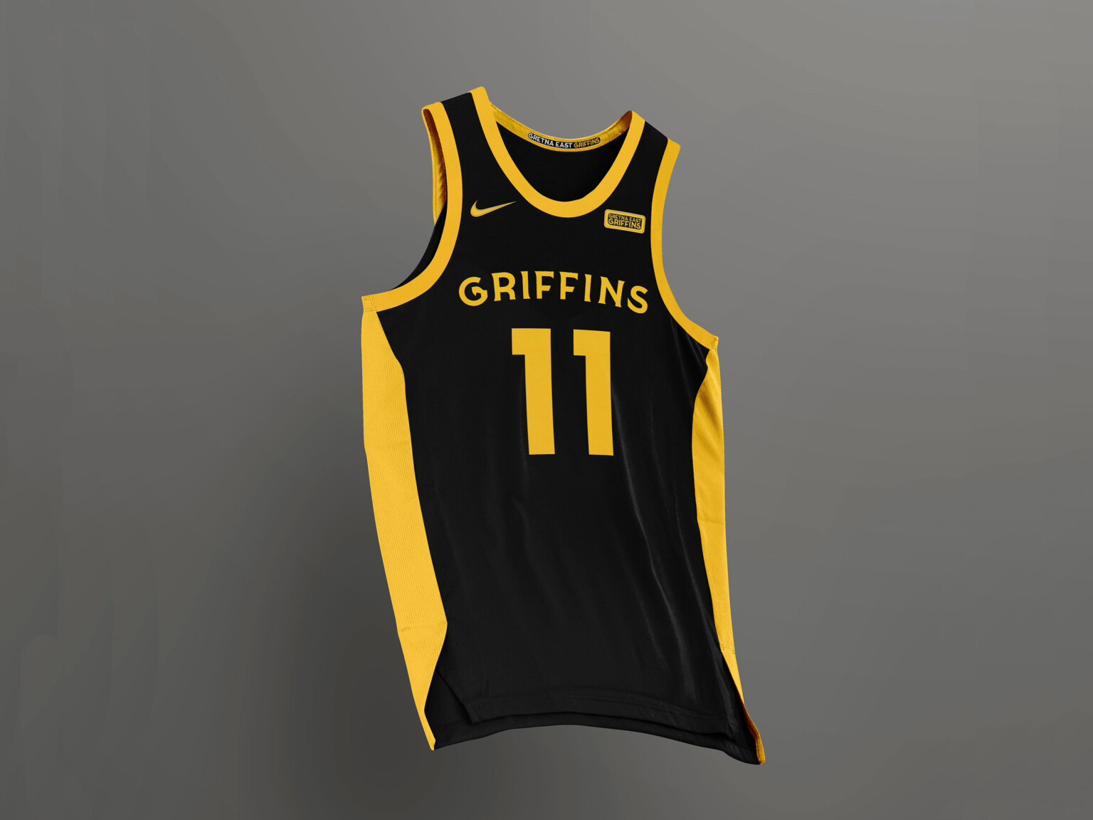 Black basketball jersey with yellow accent side panels and at edges