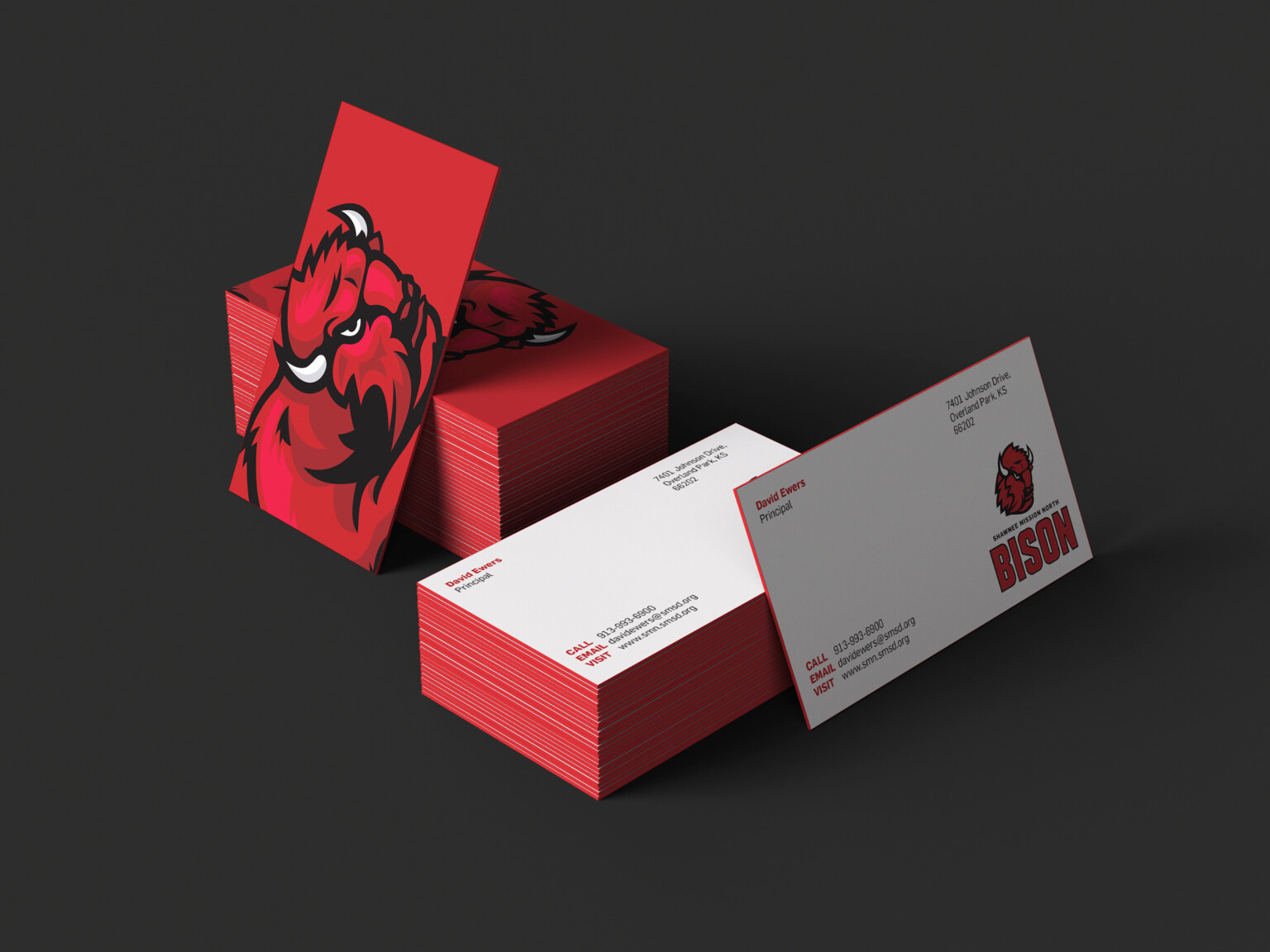 red and white business cards with Shawnee Mission High School bison logo on red side