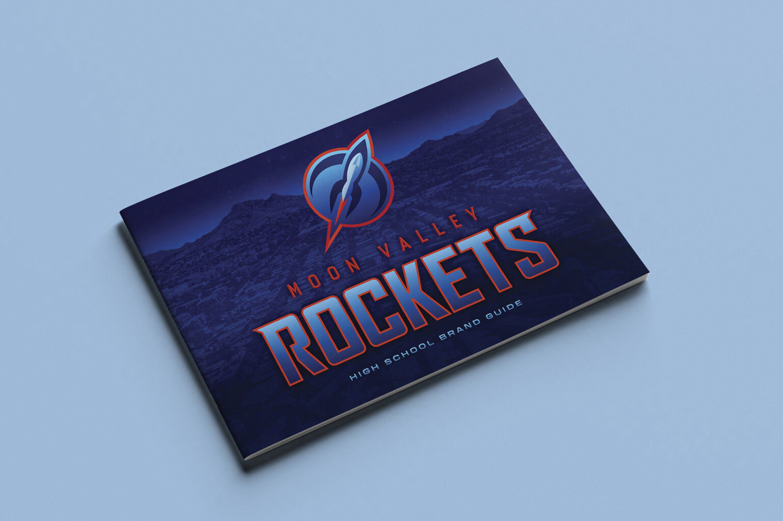 Brand book for Moon High School Rockets, in Arizona. Cover with logo
