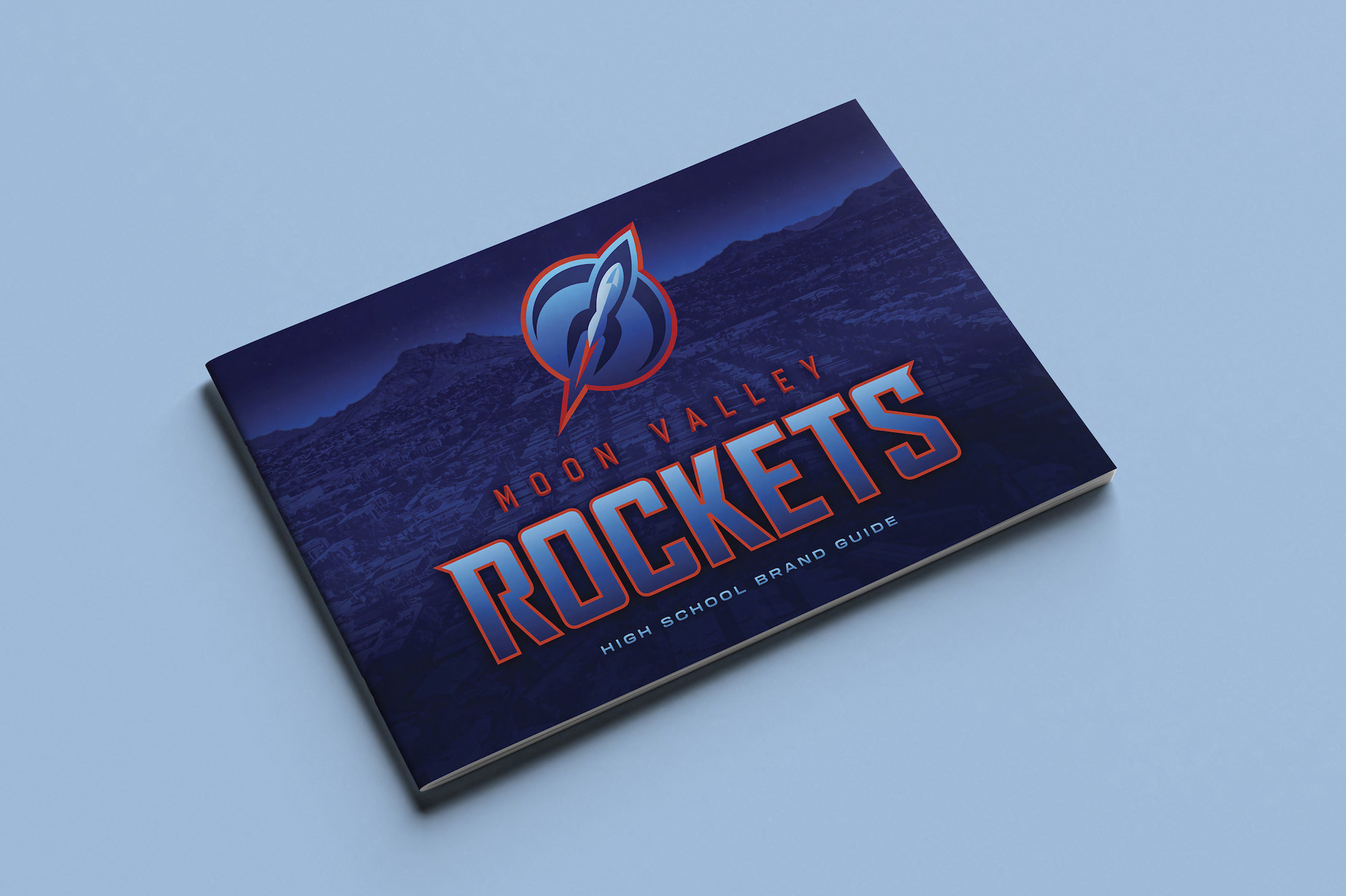 Brand book for Moon High School Rockets, in Arizona. Cover with logo
