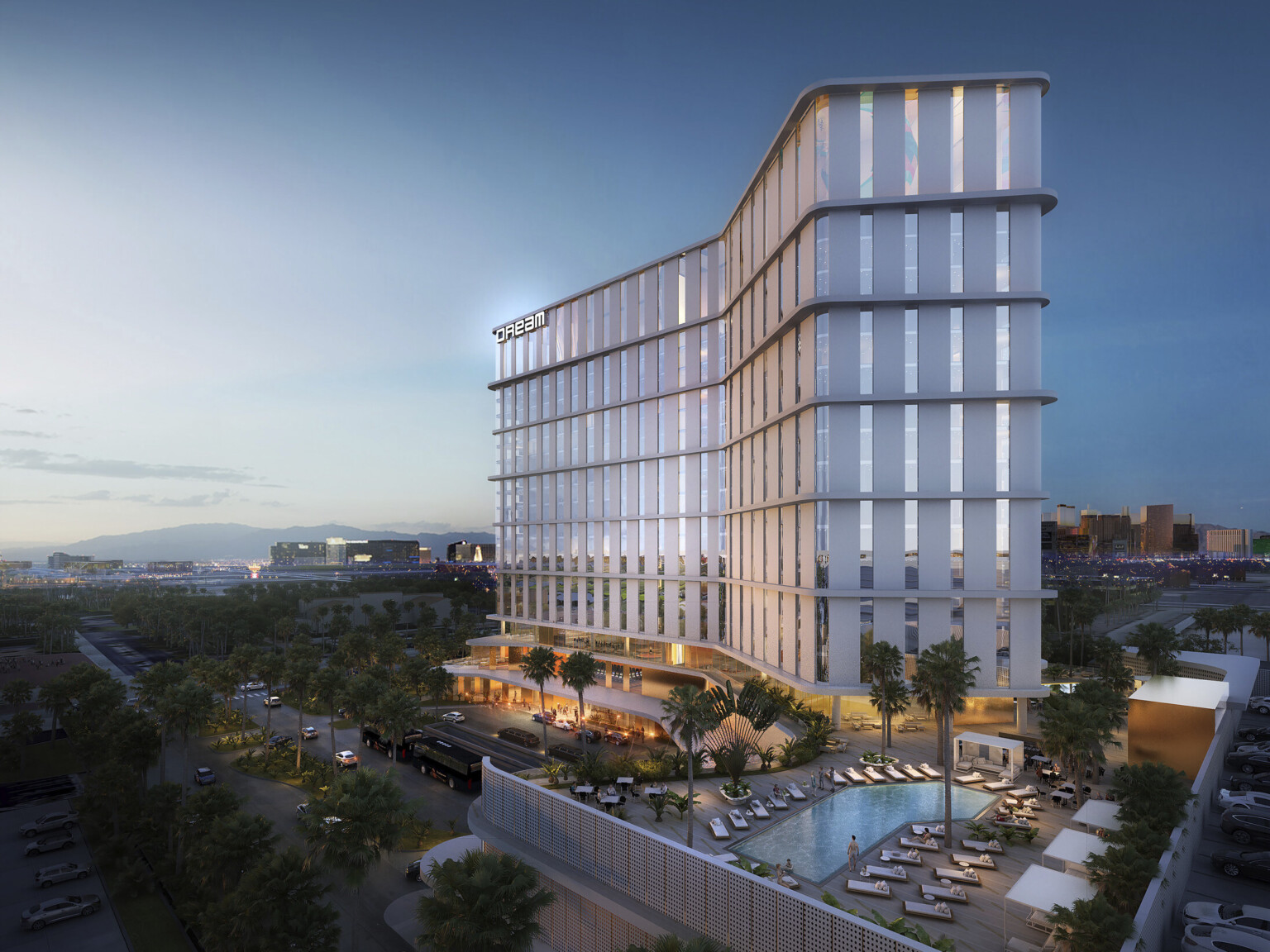 Aerial view of the Dream Las Vegas with stepped balconies extended in two angled directions with midlevel outdoor pool and lounge space