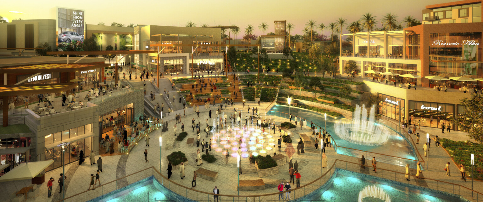 Aerial view of fountains, water feature in lower-level round courtyard, paths, stairs connect to shopping and dining destination